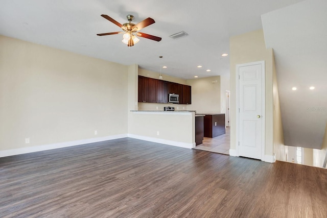 unfurnished living room with ceiling fan and light wood-type flooring