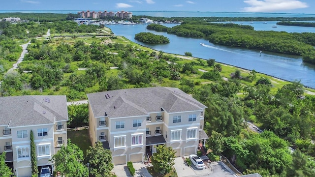 bird's eye view with a water view