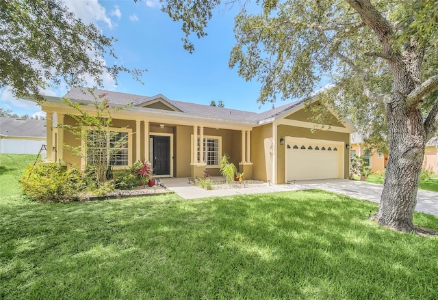 single story home featuring a garage and a front lawn