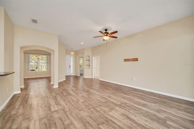 unfurnished living room with light hardwood / wood-style floors and ceiling fan