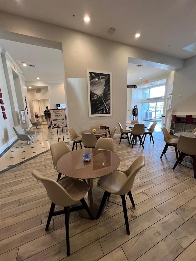 dining room with light hardwood / wood-style flooring