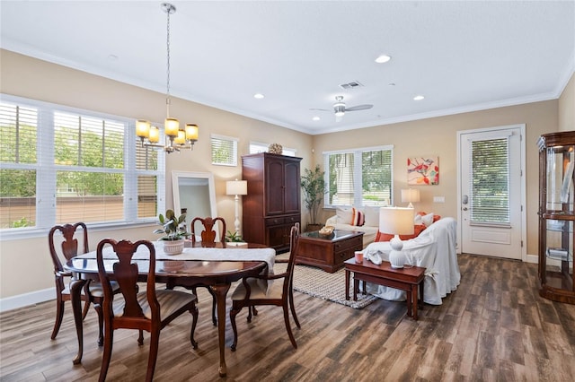 dining space with crown molding, ceiling fan with notable chandelier, and dark hardwood / wood-style floors