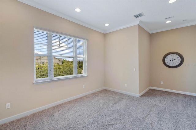 unfurnished room with light colored carpet and ornamental molding