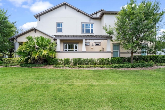 view of front of home with a front lawn