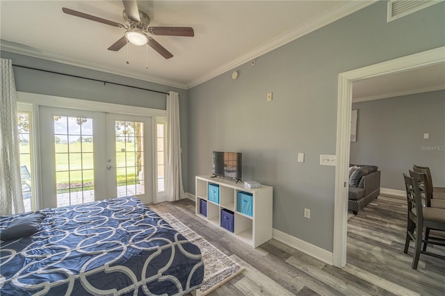 bedroom with french doors, access to outside, ornamental molding, hardwood / wood-style flooring, and ceiling fan