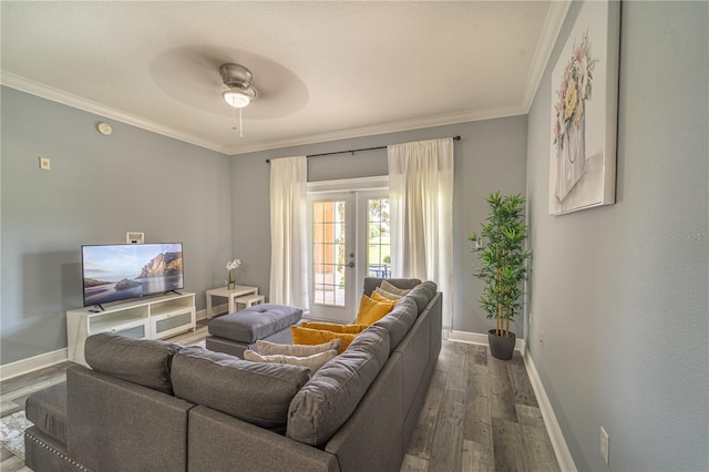 living room featuring crown molding, ceiling fan, dark hardwood / wood-style flooring, and french doors