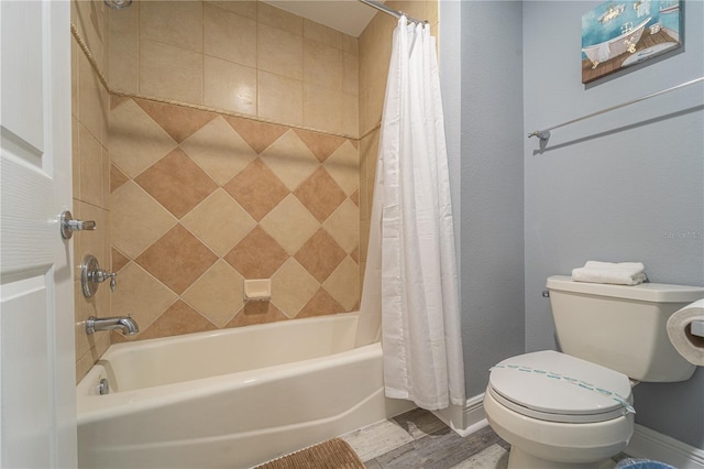 bathroom with hardwood / wood-style floors, shower / bath combination with curtain, and toilet