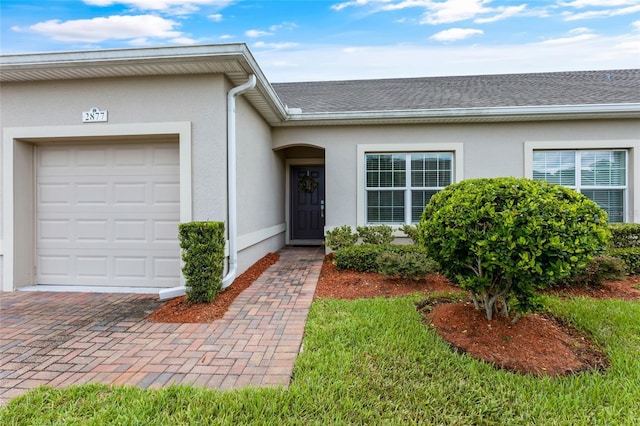 property entrance featuring a garage