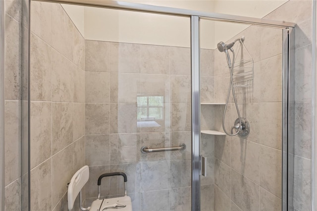 bathroom featuring walk in shower