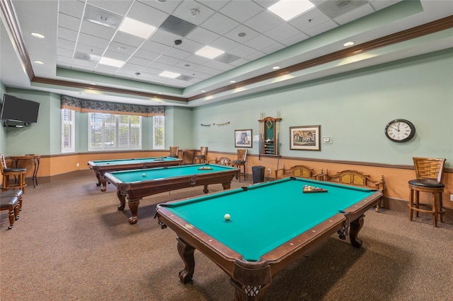 recreation room with carpet flooring, a paneled ceiling, a tray ceiling, and pool table