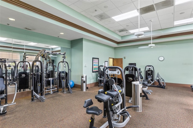 exercise room featuring a paneled ceiling