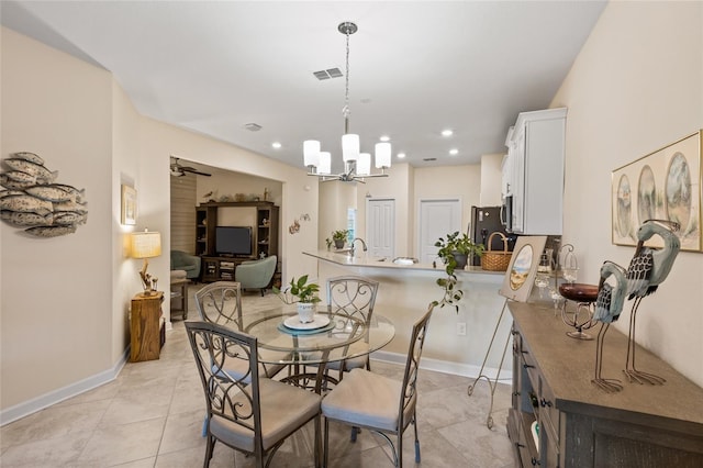 dining area featuring visible vents, baseboards, recessed lighting, a chandelier, and light tile patterned floors