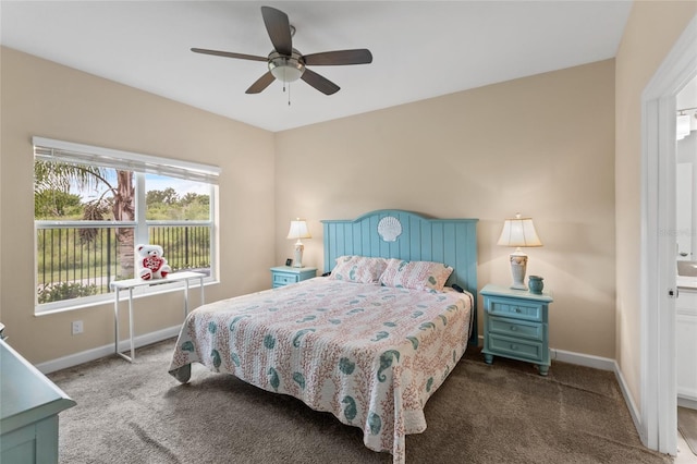 carpeted bedroom with a ceiling fan and baseboards