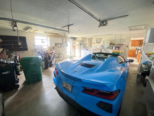 garage featuring washer and dryer