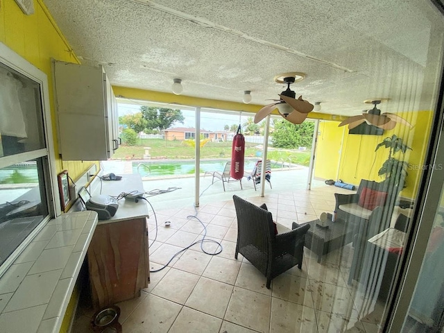 view of patio with ceiling fan