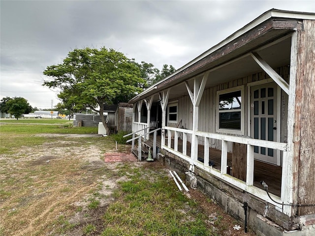 view of home's exterior with covered porch