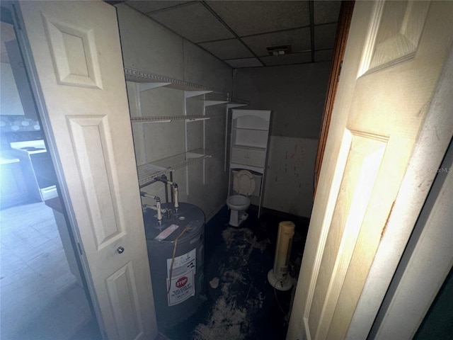 utility room featuring electric water heater