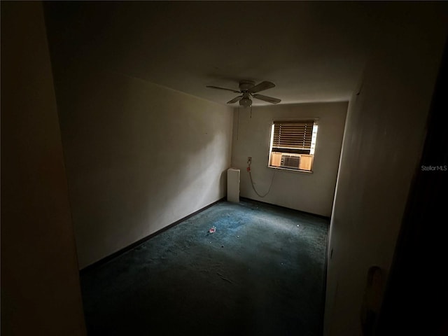 carpeted empty room with cooling unit and ceiling fan