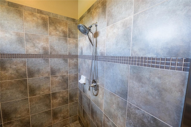 room details with a tile shower