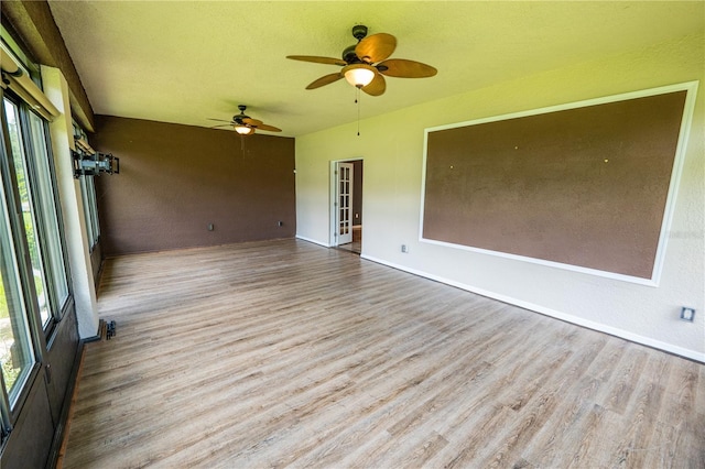 interior space featuring ceiling fan and light hardwood / wood-style flooring