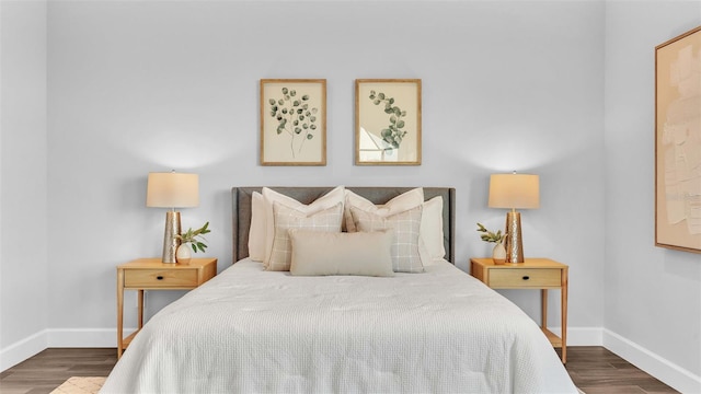 1529 Rio Vista Ter, Parrish, FL 34219 - bedroom with baseboards and wood finished floors