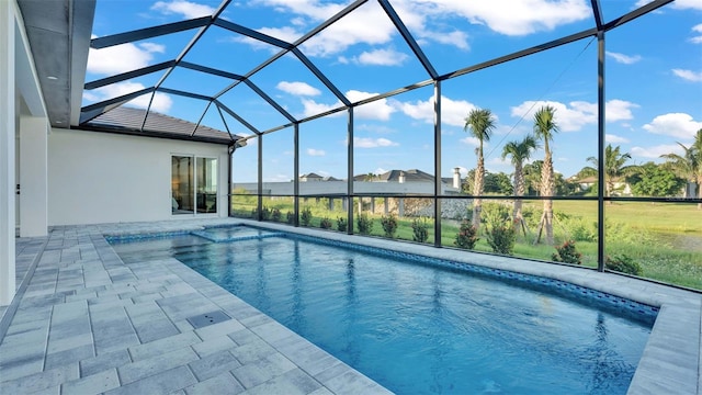 1529 Rio Vista Ter, Parrish, FL 34219 - outdoor pool featuring glass enclosure and a patio area