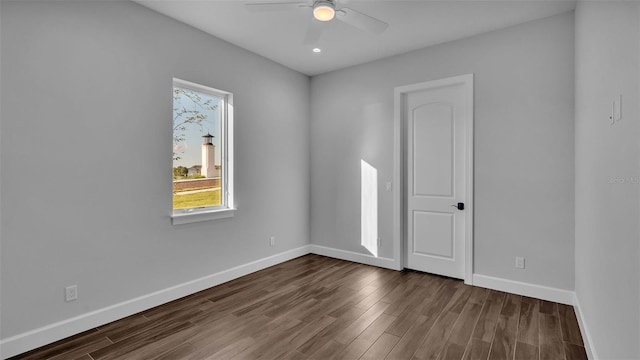 1529 Rio Vista Ter, Parrish, FL 34219 - unfurnished room with dark wood-style flooring, ceiling fan, recessed lighting, and baseboards