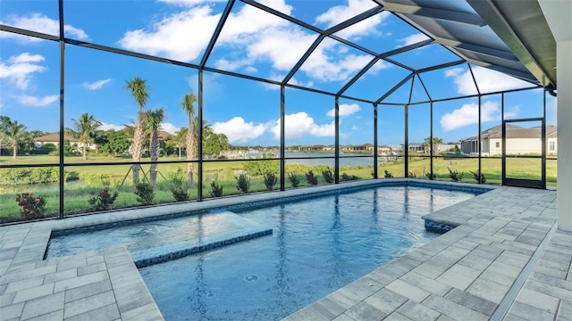 1529 Rio Vista Ter, Parrish, FL 34219 - pool featuring glass enclosure, a water view, and a patio