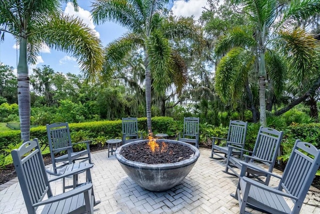 1529 Rio Vista Ter, Parrish, FL 34219 - view of patio / terrace featuring a fire pit