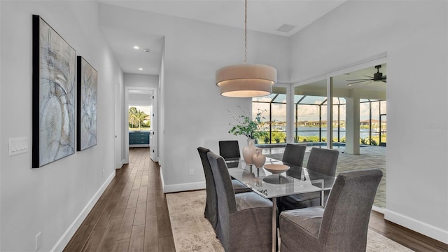 1529 Rio Vista Ter, Parrish, FL 34219 - dining space featuring baseboards, ceiling fan, and wood finished floors