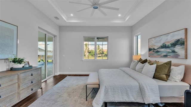 1529 Rio Vista Ter, Parrish, FL 34219 - bedroom with access to outside, dark wood finished floors, a ceiling fan, a tray ceiling, and visible vents