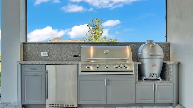 1529 Rio Vista Ter, Parrish, FL 34219 - details with stucco siding and stainless steel fridge