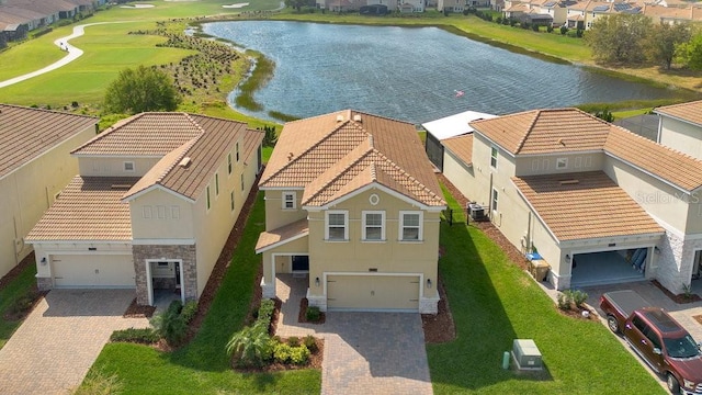 drone / aerial view featuring a water view