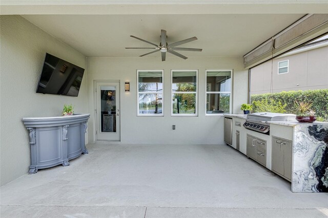 view of patio featuring a grill, exterior kitchen, and ceiling fan