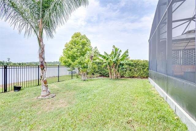 view of yard with a lanai