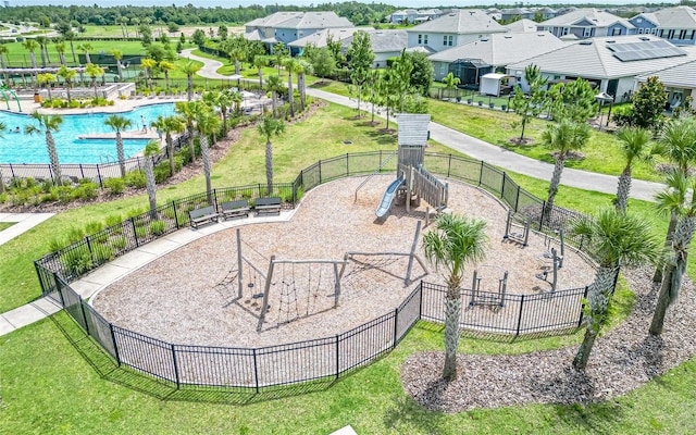 surrounding community featuring a yard and a pool