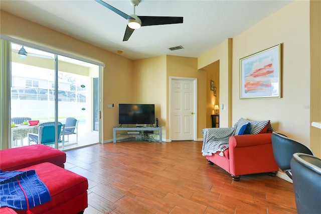 living room with ceiling fan