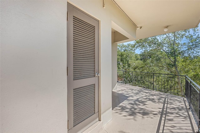 view of patio with a balcony