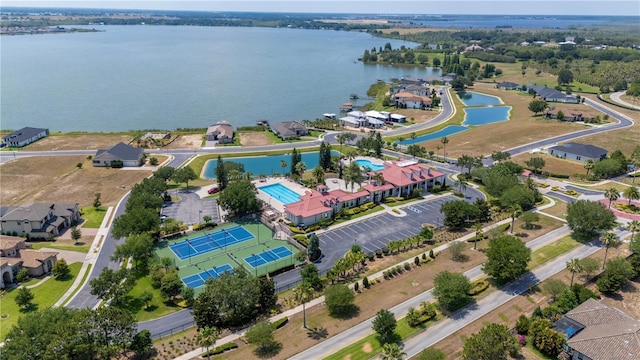 bird's eye view with a water view