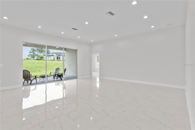 unfurnished room featuring recessed lighting, visible vents, baseboards, and marble finish floor