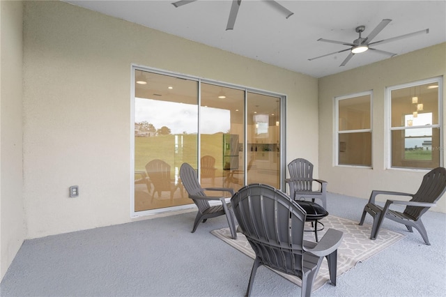 view of patio / terrace featuring ceiling fan