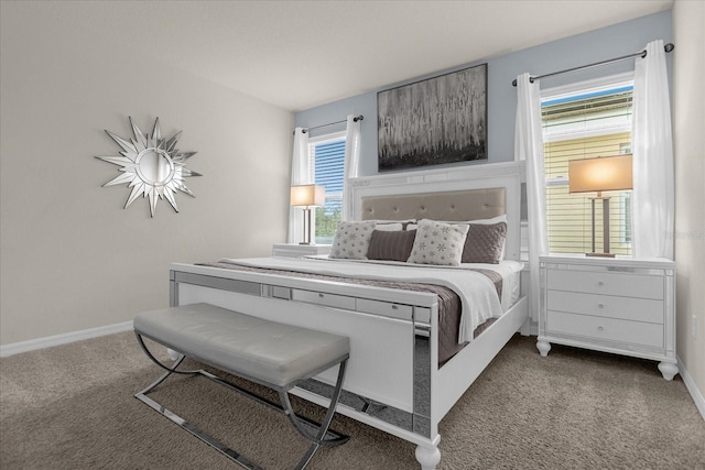 bedroom featuring carpet floors and multiple windows