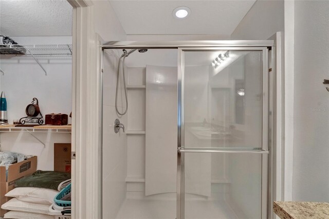 bathroom featuring walk in shower