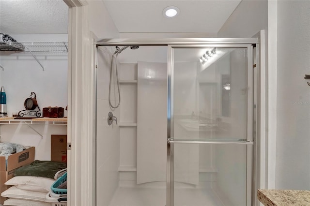 bathroom with an enclosed shower