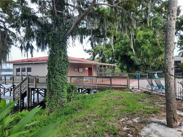 exterior space featuring a swimming pool side deck