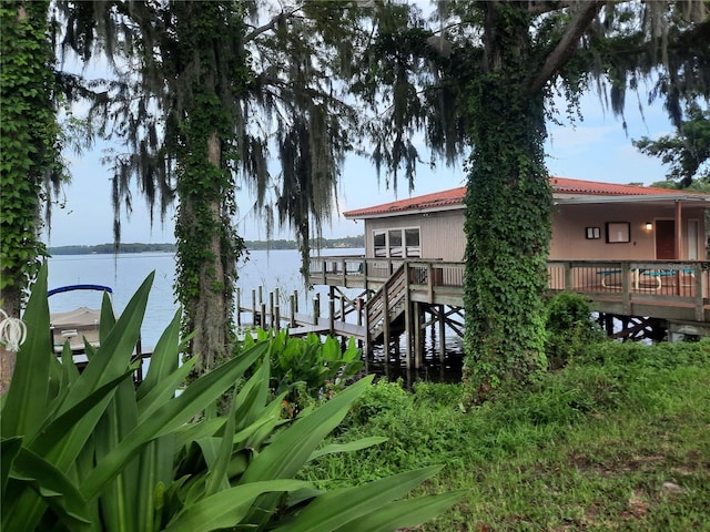 dock area with a deck with water view