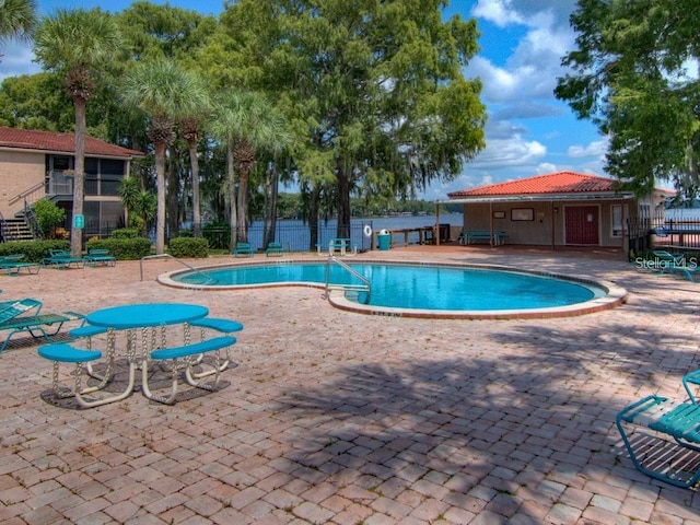 view of pool with a patio