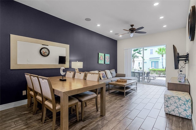 dining area with ceiling fan and hardwood / wood-style flooring