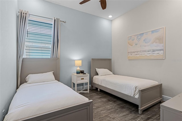 bedroom featuring hardwood / wood-style flooring and ceiling fan