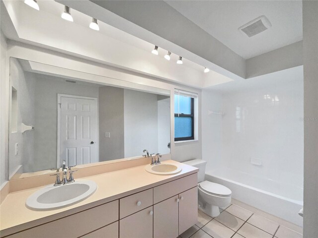 full bathroom with vanity, toilet, bathing tub / shower combination, and tile patterned flooring